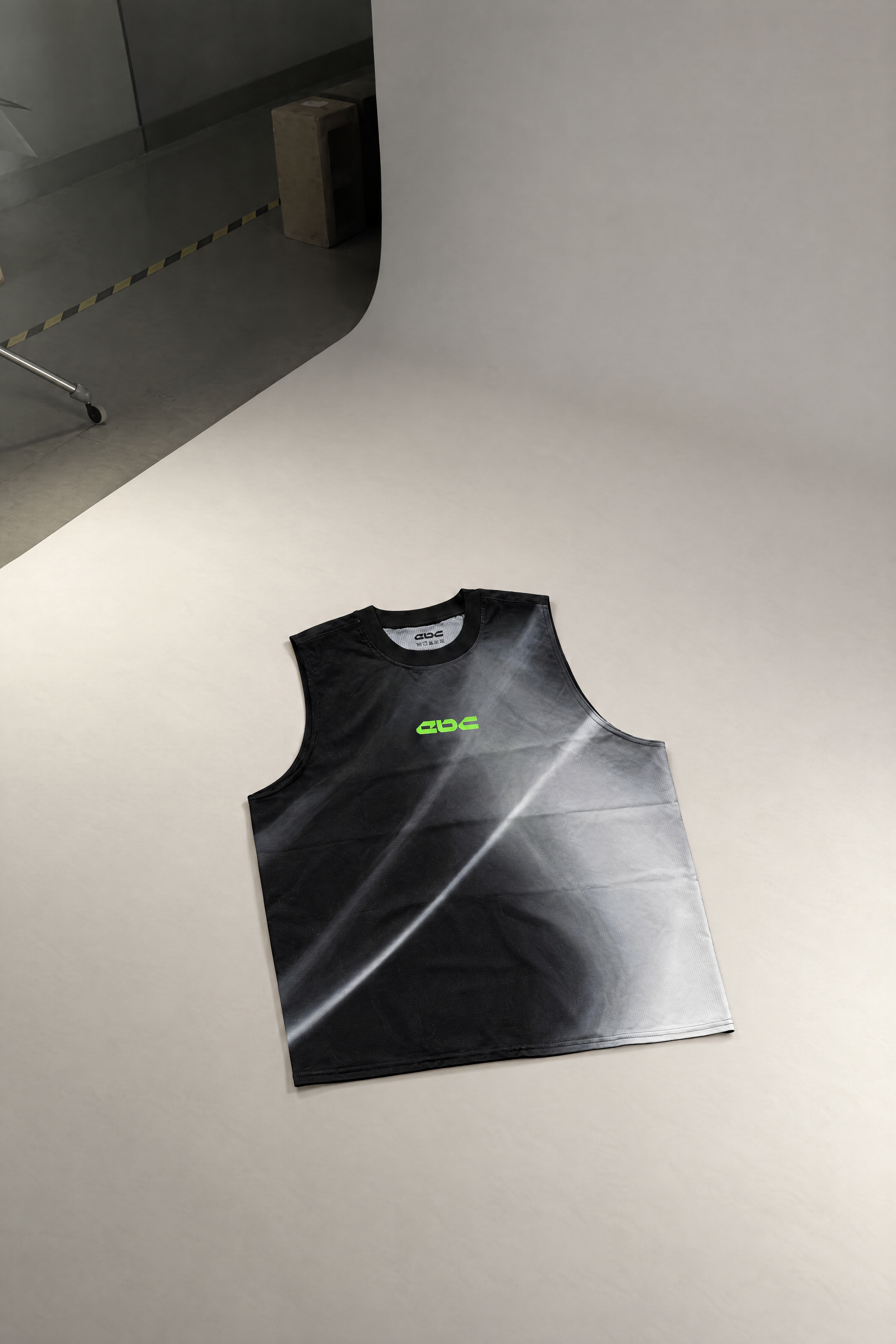 Everyday Better Club vest photographed on a studio backdrop